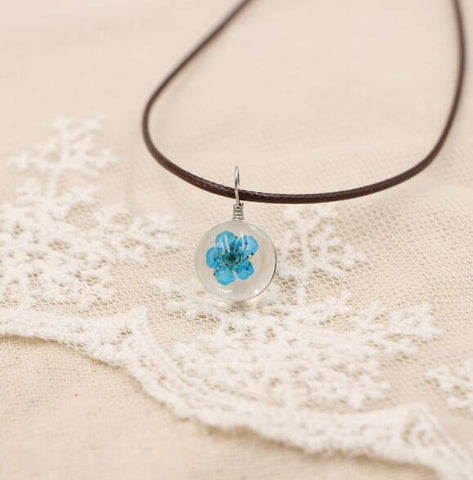 Image of Boho Transparent Resin Dried Flower Necklace.
