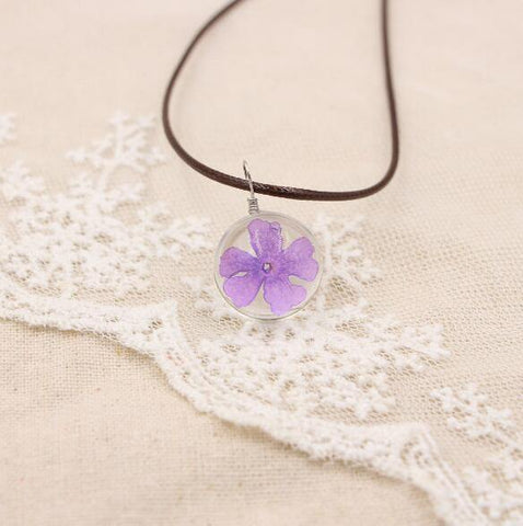 Image of Boho Transparent Resin Dried Flower Necklace.