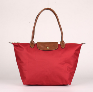 Folding waterproof nylon handbag.