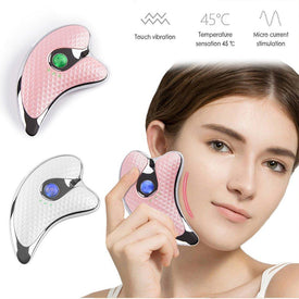 Heating Scraping Apparatus Facial Massager.