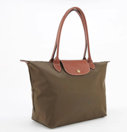 Image of Folding waterproof nylon handbag.