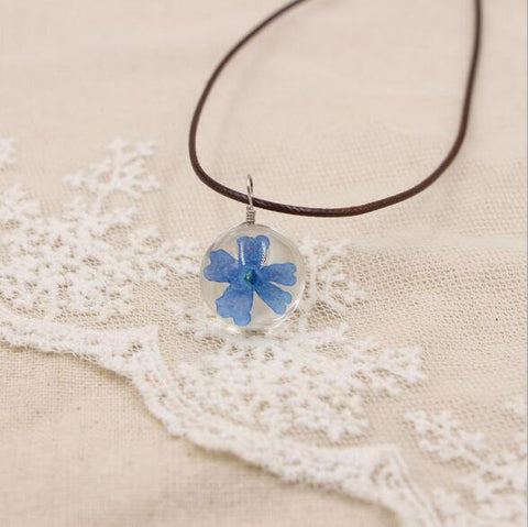 Image of Boho Transparent Resin Dried Flower Necklace.