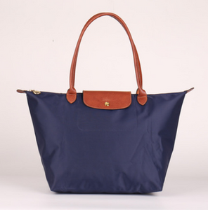 Folding waterproof nylon handbag.