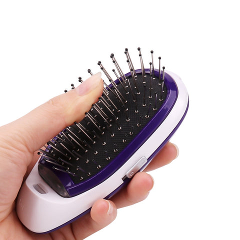 Image of Portable Electric Ionic Hairbrush.